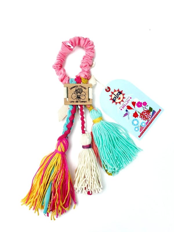 Moño Culebrilla Andina hechoa a mano con residuos textiles del desierto de Atacama.